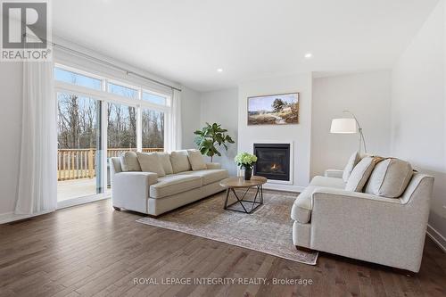 444 Ejs Lane, Beckwith, ON - Indoor Photo Showing Living Room With Fireplace