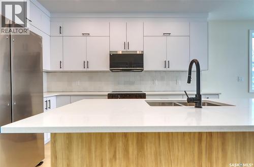2475 Mcara Street, Regina, SK - Indoor Photo Showing Kitchen With Double Sink With Upgraded Kitchen