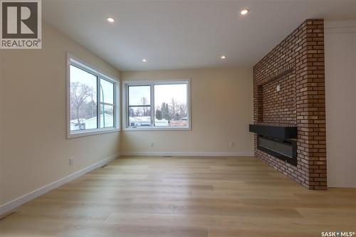 2475 Mcara Street, Regina, SK - Indoor With Fireplace