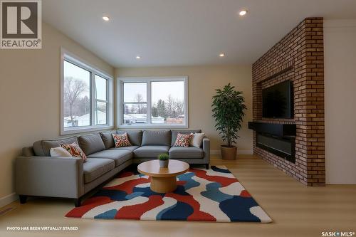2475 Mcara Street, Regina, SK - Indoor Photo Showing Living Room With Fireplace