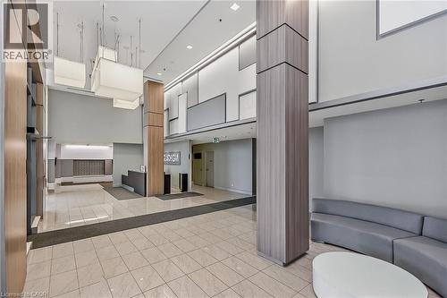 Security and 24 hour concierge. - 2081 Fairview Street Unit# 1402, Burlington, ON - Indoor Photo Showing Other Room