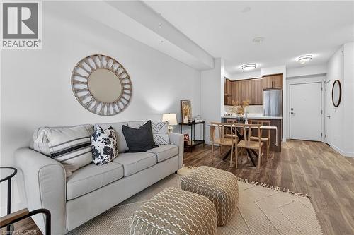 Open Concept ideal for entertaining. - 2081 Fairview Street Unit# 1402, Burlington, ON - Indoor Photo Showing Living Room