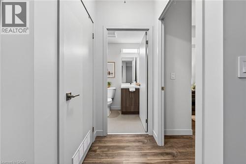 Corridor leading to laundry, bathroom and bedroom - 2081 Fairview Street Unit# 1402, Burlington, ON - Indoor Photo Showing Other Room