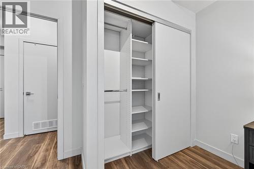 Custom closet organizer in bedroom - 2081 Fairview Street Unit# 1402, Burlington, ON - Indoor