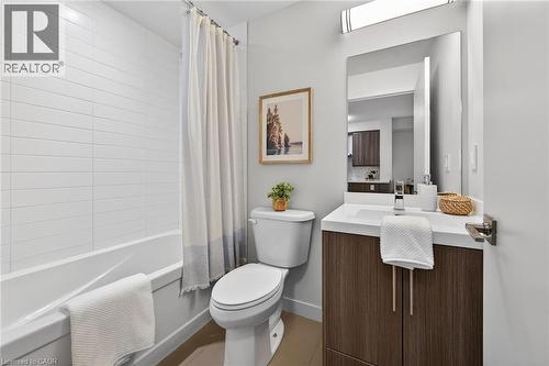 Fresh, clean lines and neutral finishes. - 2081 Fairview Street Unit# 1402, Burlington, ON - Indoor Photo Showing Bathroom