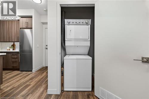 Convenient in-suite laundry. - 2081 Fairview Street Unit# 1402, Burlington, ON - Indoor Photo Showing Laundry Room