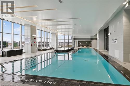 Indoor pool, not tub, sauna, change rooms ... this space is just one of many of the fabulous amenities in this building. - 2081 Fairview Street Unit# 1402, Burlington, ON - Indoor Photo Showing Other Room With In Ground Pool