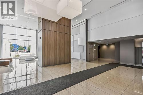 Inviting and spacious lobby.  Security and concierge in house. - 2081 Fairview Street Unit# 1402, Burlington, ON - Indoor Photo Showing Other Room