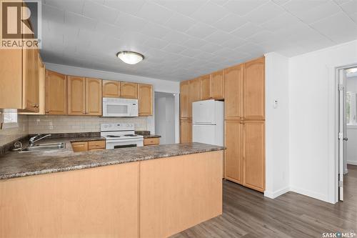 125 Central Avenue S, Christopher Lake, SK - Indoor Photo Showing Kitchen With Double Sink