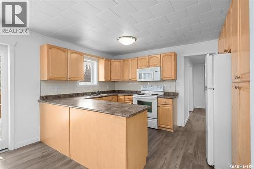 125 Central Avenue S, Christopher Lake, SK - Indoor Photo Showing Kitchen With Double Sink