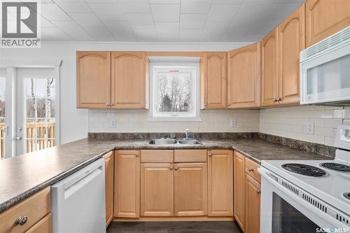125 Central Avenue S, Christopher Lake, SK - Indoor Photo Showing Kitchen With Double Sink
