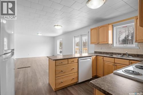125 Central Avenue S, Christopher Lake, SK - Indoor Photo Showing Kitchen With Double Sink