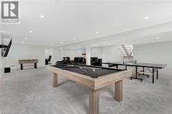 Rec room featuring billiards table and recessed lighting - 