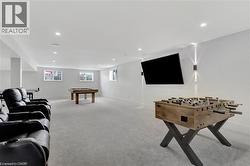 Recreation room featuring light carpet, recessed lighting, and billiards table - 