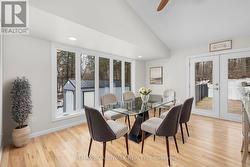 Dining area with large bright window. - 