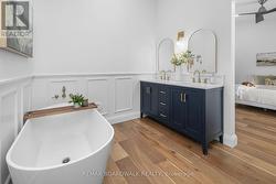 En-suite with double vanity. - 