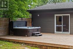 Relaxing hot tub with privacy fence. - 