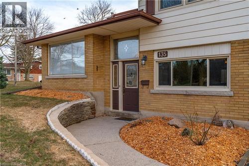 Doorway to property featuring brick siding - 135 Burbank Road, Kitchener, ON - Outdoor With Exterior