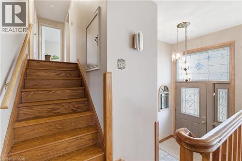 Stairs with suspended lighting - 135 Burbank Road, Kitchener, ON - Indoor Photo Showing Other Room