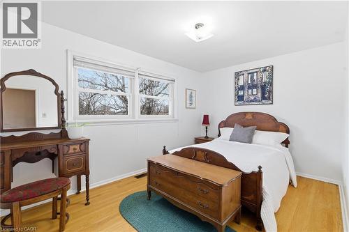 Bedroom featuring light wood finished floors and baseboards - 135 Burbank Road, Kitchener, ON - Indoor Photo Showing Bedroom