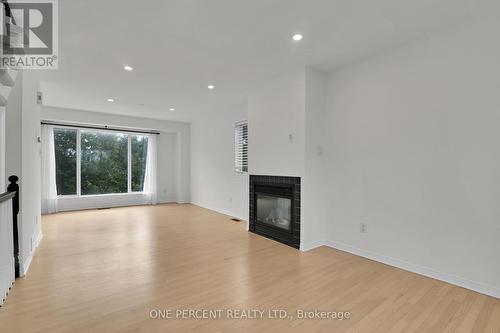563 Burleigh Private, Ottawa, ON - Indoor Photo Showing Living Room With Fireplace