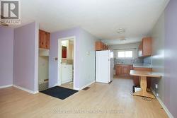 Open Concept Main Floor Looking into the Kitchen. - 