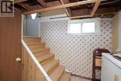 Stairs to the Lower Level of the Home. - 