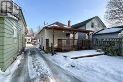 Mutual Driveway & Covered Deck in the Backyard. - 