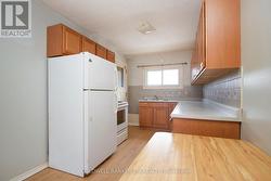 Updated Kitchen with Ample Storage Space. - 
