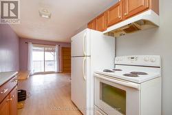 Kitchen Looking into the Dining & Living Room. - 