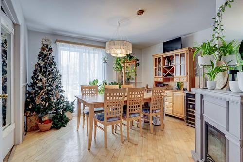 Salle à manger - 293  - 297 Rue De Montigny, Saint-Jérôme, QC - Indoor Photo Showing Dining Room With Fireplace
