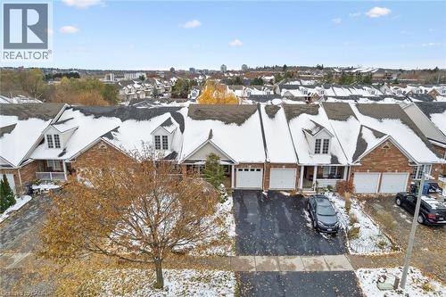 Snowy aerial view featuring a residential view - 92 Schroder Crescent, Guelph, ON - Outdoor