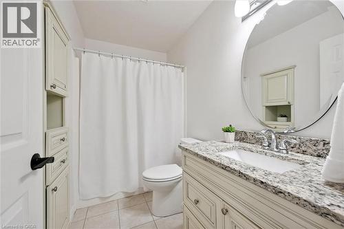 Full bath featuring vanity and light tile patterned floors - 92 Schroder Crescent, Guelph, ON - Indoor Photo Showing Bathroom