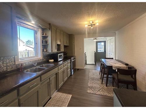 1201 Second St E., Fort Frances, ON - Indoor Photo Showing Kitchen With Double Sink