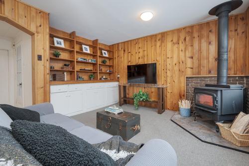 Salle familiale - 62 Rue Elm, Hudson, QC - Indoor With Fireplace