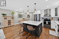 Stone countertops throughout the kitchen - 