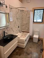 custom 4-piece bathroom with jacuzzi tub - 