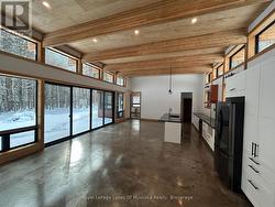 12 foot ceilings, multiple walkouts - 
