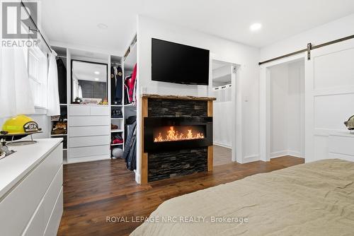 Primary suite - 458 Doan'S Ridge Road, Welland (Cooks Mills), ON - Indoor Photo Showing Bedroom With Fireplace