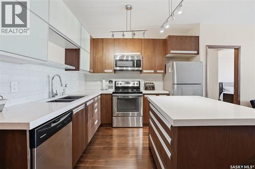 414 2101 Heseltine Road, Regina, SK - Indoor Photo Showing Kitchen With Stainless Steel Kitchen With Double Sink With Upgraded Kitchen