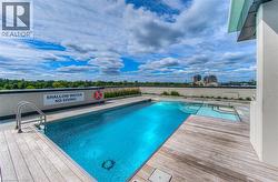 Community pool with a patio area - 