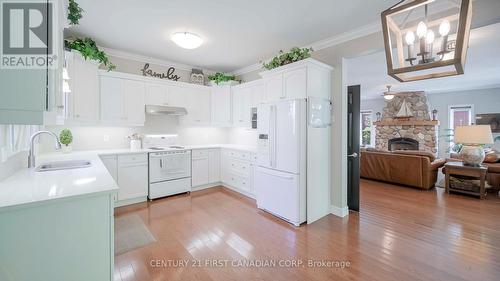 327 Richmeadow Road, London North (North M), ON - Indoor Photo Showing Kitchen With Fireplace With Double Sink