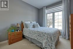 SECOND BEDROOM-MAIN FLOOR - 