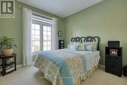 THIRD BEDROOM- MAIN FLOOR - 