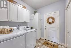 LAUNDRY ROOM/ MUD ROOM OFF KITCHEN - 