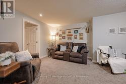 FAMILY ROOM LOWER LEVEL ( DOOR TO LOWER LVL FOYER) - 