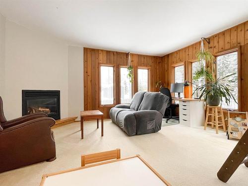 6 Beech Cresent, Ear Falls, ON - Indoor Photo Showing Living Room With Fireplace