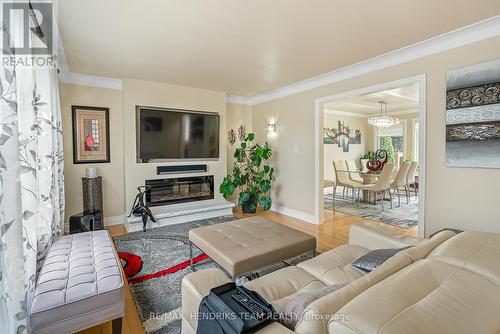 415 Riverside Drive, Welland (Broadway), ON - Indoor Photo Showing Living Room With Fireplace