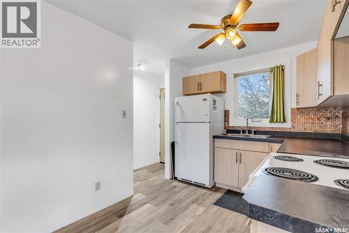 3205 33Rd Street W, Saskatoon, SK - Indoor Photo Showing Kitchen With Double Sink