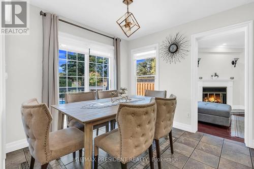 6200 Osprey Boulevard, Mississauga, ON - Indoor Photo Showing Dining Room With Fireplace